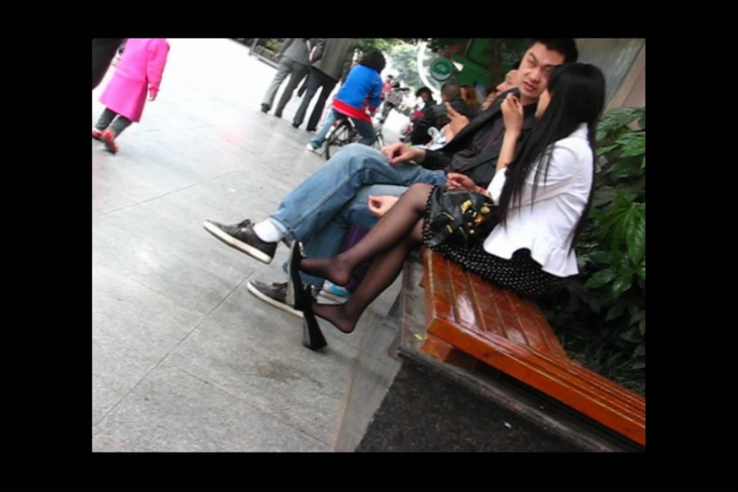 Flatshoes are black beside black sneakers